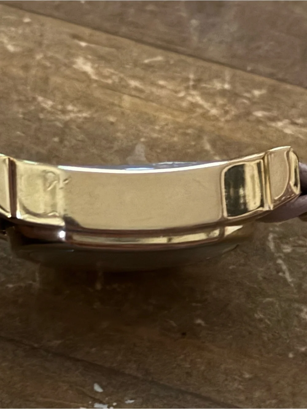 LA Mer Collections gold chain and leather wrap bracelet watch